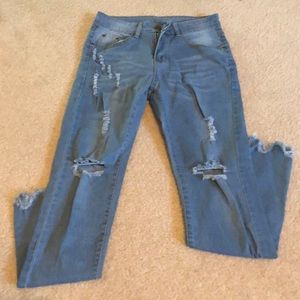 Distressed frayed jeans